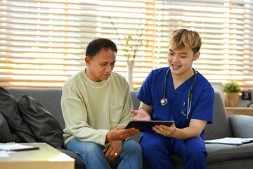 Senior patient consulting with doctor at private hospital. Elderly medical healthcare concept