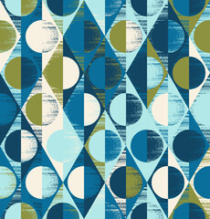 Geometric seamless pattern of rhombuses, triangles and circles chaotically painted in teal, olive, cream and light blue. Design for wallpaper, wrapping products, textiles, fabrics.