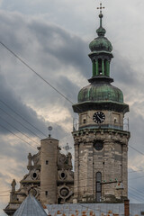 Lviv, Ukraine - August, 2022: The bell tower of St. Andrew church (former Bernardine church), located in Old Town of Lviv, south of market square.