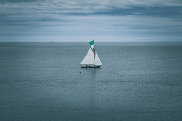 Sailboats and yachts at sea in the amazing light of the sunset on the sea bay in Howth, Ireland