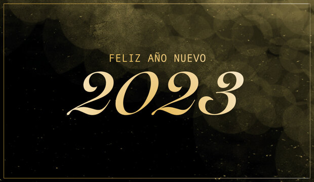 Background with text Happy New Year 2023 in Spanish. Christmas banner, bright Horizontal Christmas banners, cards, headers, websites. Gold glitter with a black background.Banner "Feliz año nuevo 2023"