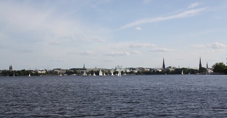 Sightseeing tour on the Alster in Hamburg with a view of 5 famous church towers