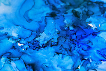 Abstract liquid ink art painting as background, closeup