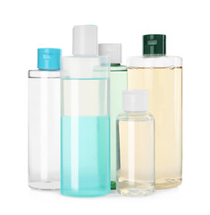 Bottles of micellar cleansing water on white background