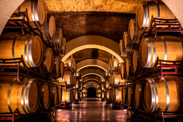 Cellar with barrels for storage of wine in Spain - obrazy, fototapety, plakaty