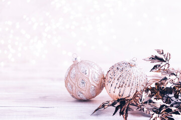 Golden christmas balls with bokeh.