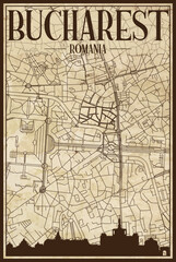 Brown printout streets network map with city skyline of the downtown BUCHAREST, ROMANIA on a vintage paper framed background