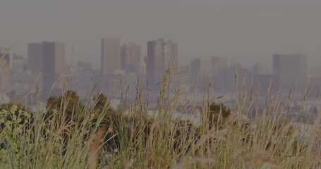 Image of scope scanning with padlock icon over cityscape