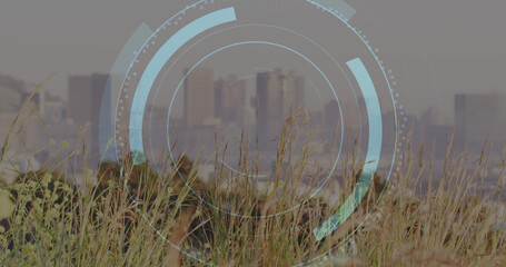 Image of scope scanning with padlock icon over cityscape