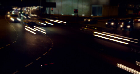 Image of statistical data processing against city traffic at night