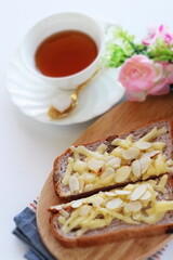 Homemade sliced almond and cheese on Walnut bread toast for nutrition breakfast image