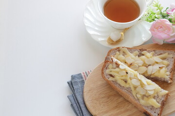 Homemade sliced almond and cheese on Walnut bread toast for nutrition breakfast image