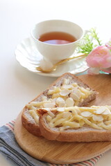 Homemade sliced almond and cheese on Walnut bread toast for nutrition breakfast image