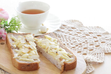 Homemade sliced almond and cheese on Walnut bread toast for nutrition breakfast image