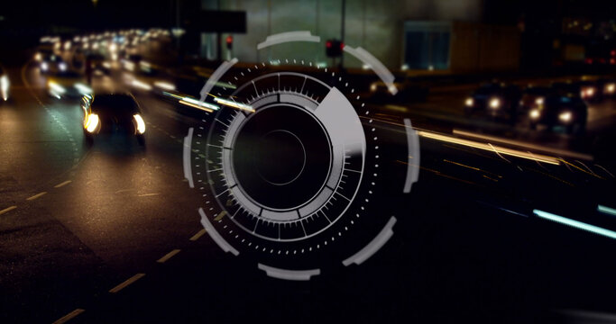 Image of interface with data processing against aerial view of city traffic at night