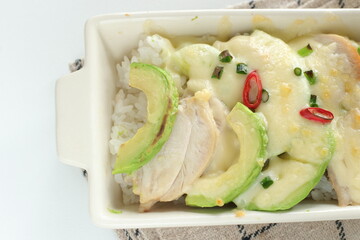 Homemade avocado and chicken cheese gratin 