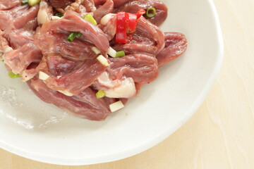 Chinese cooking, prepared Chicken heart and spring onion seasoning marinade 