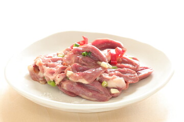 Chinese cooking, prepared Chicken heart and spring onion seasoning marinade 