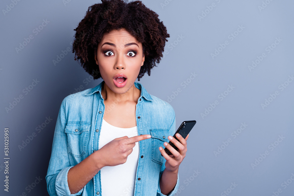 Canvas Prints Photo of impressed shocked lady open mouth indicate finger telephone isolated on grey color background