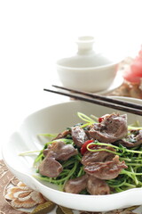 Chinese cuisine, chicken gizzard and pea sprout stir fried