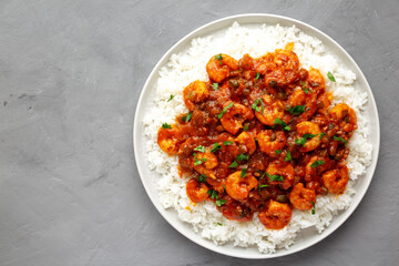 Homemade Cuban Shrimp Creole on a Plate on a gray surface, top view. Flat lay, overhead, from above. Copy space.