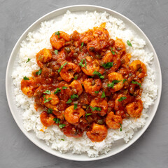 Homemade Cuban Shrimp Creole on a Plate on a gray surface, top view. Flat lay, overhead, from above.
