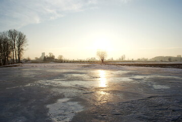 Snow crust - ice cover over the snow on meadow.
