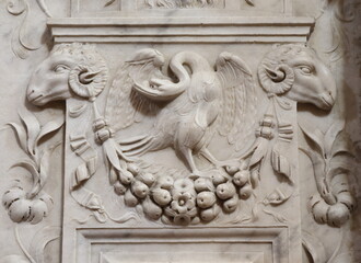 Fototapeta na wymiar Santa Maria della Pace Church Interior Sculpted Detail with Bird and Ram Heads in Rome, Italy