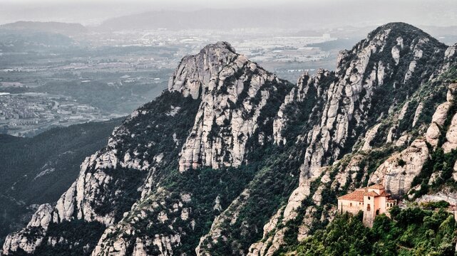 Beautiful shot of a Holy Cave Of Montserrat surrounded by mountains