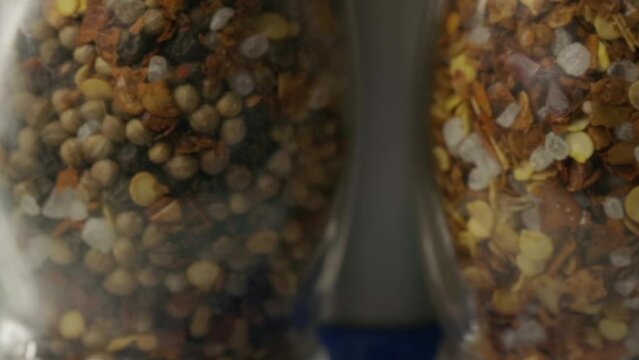 glass spice bottles rotate in a circle