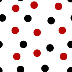 Seamless pattern of red and black polka dots on a white background