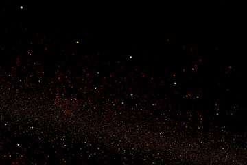 Abstract black background with gold particles for design