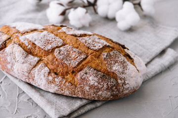Bread rye, whole grain on a grey background