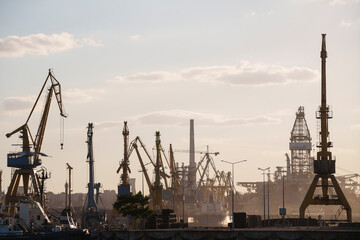 Obraz premium Container terminal, with cranes, in a commercial port