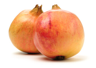 Juicy pomegranate on white background