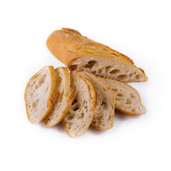 Sliced traditional french baguette on white
