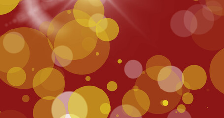 Image of glowing yellow spots on red background