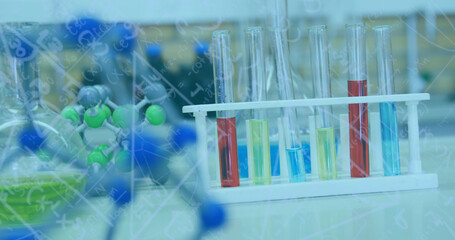 Image of mathematical and scientific formulae over chemistry laboratory