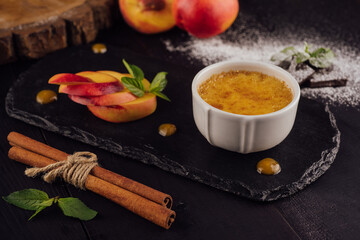 cup of creme brulee with apricot pieces