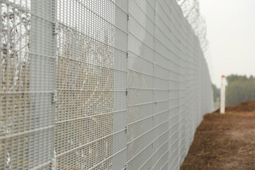 Barbed wire steel wall against the immigrations in Europe