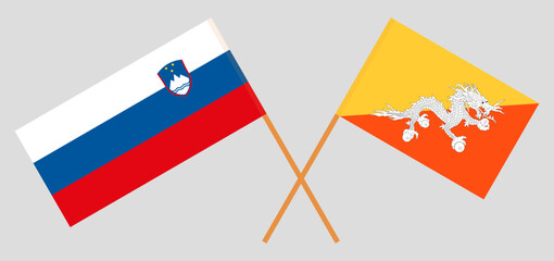 Crossed flags of Slovenia and Bhutan. Official colors. Correct proportion