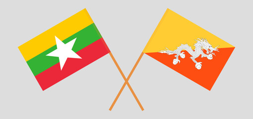 Crossed flags of Myanmar and Bhutan. Official colors. Correct proportion