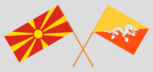 Crossed flags of North Macedonia and Bhutan. Official colors. Correct proportion