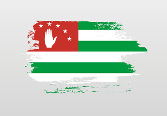 Modern style brush painted splash flag of Abkhazia with solid background