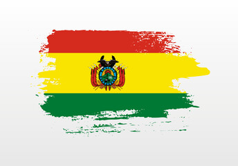 Modern style brush painted splash flag of Bolivia with solid background