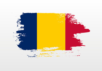 Modern style brush painted splash flag of Chad with solid background