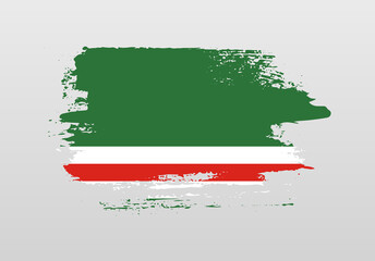 Modern style brush painted splash flag of Chechen Republic of Ichkeria with solid background