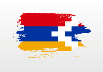 Modern style brush painted splash flag of Nagorno-Karabakh Republic with solid background
