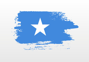 Modern style brush painted splash flag of Somalia with solid background