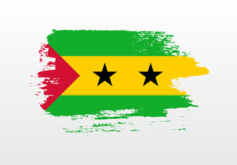 Modern style brush painted splash flag of Sao Tome and Principe with solid background